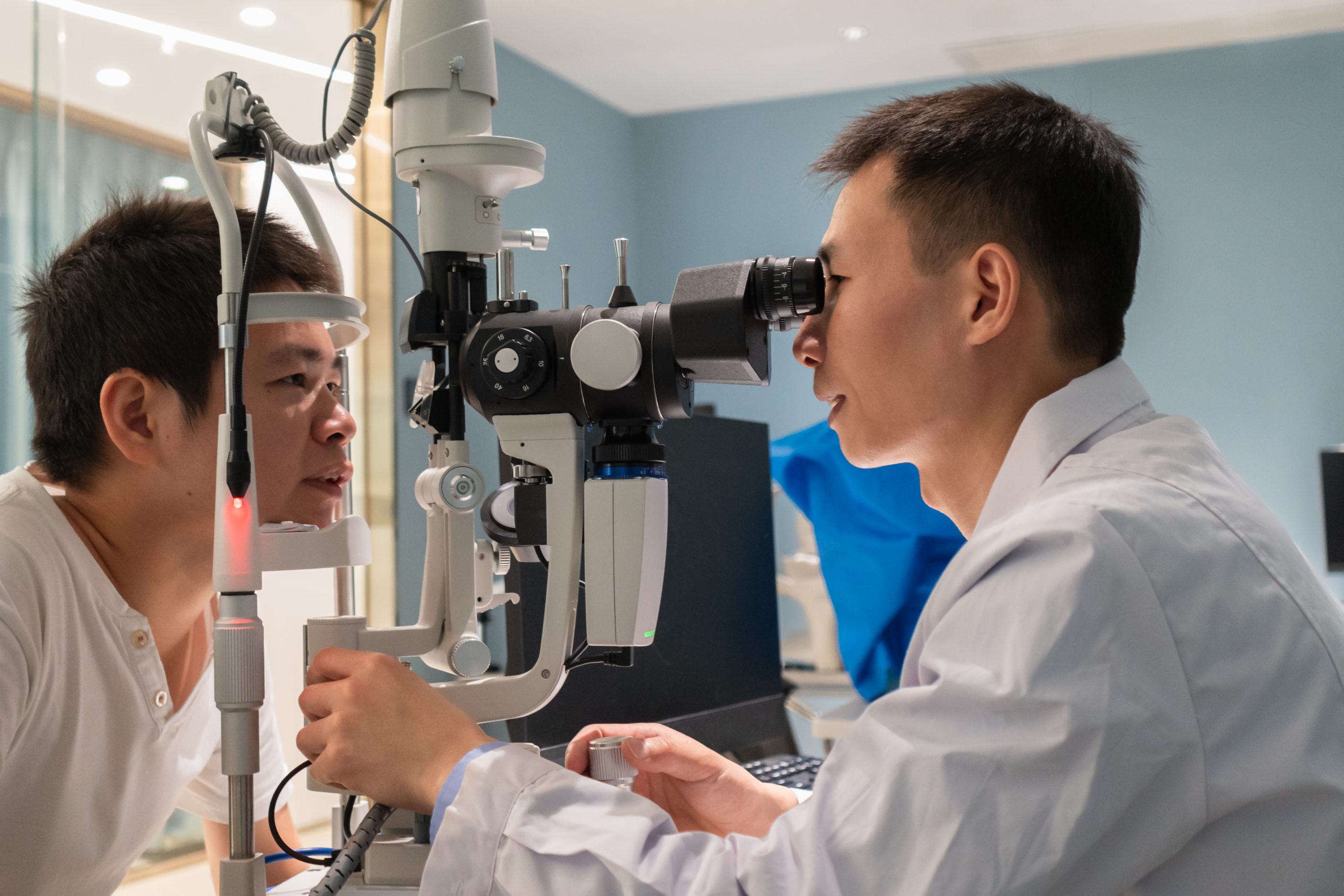 Eye exam-Acanthamoeba A man gets an exam an eye doctor