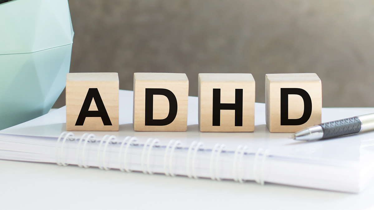 ADHD Blocks ADHD wooden blocks on top of pen and paper