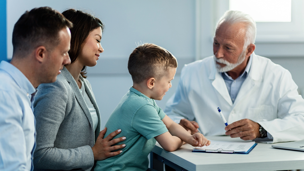 doctor meeting with parents and their son A doctor meeting with parents and their son