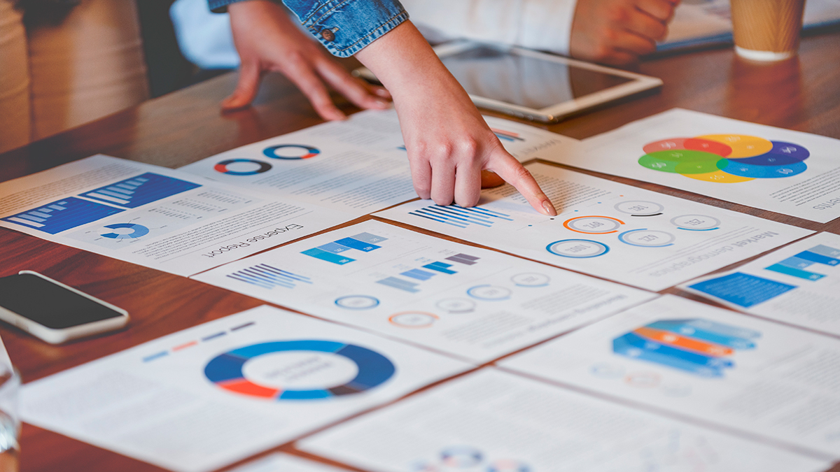 Access NASS data thumbnail People pointing to data charts