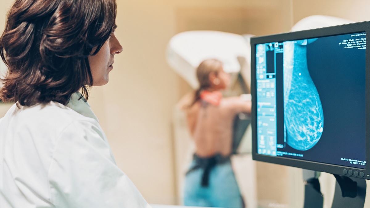 breast cancer screening A radiologist looks at a mammogram on a computer screen