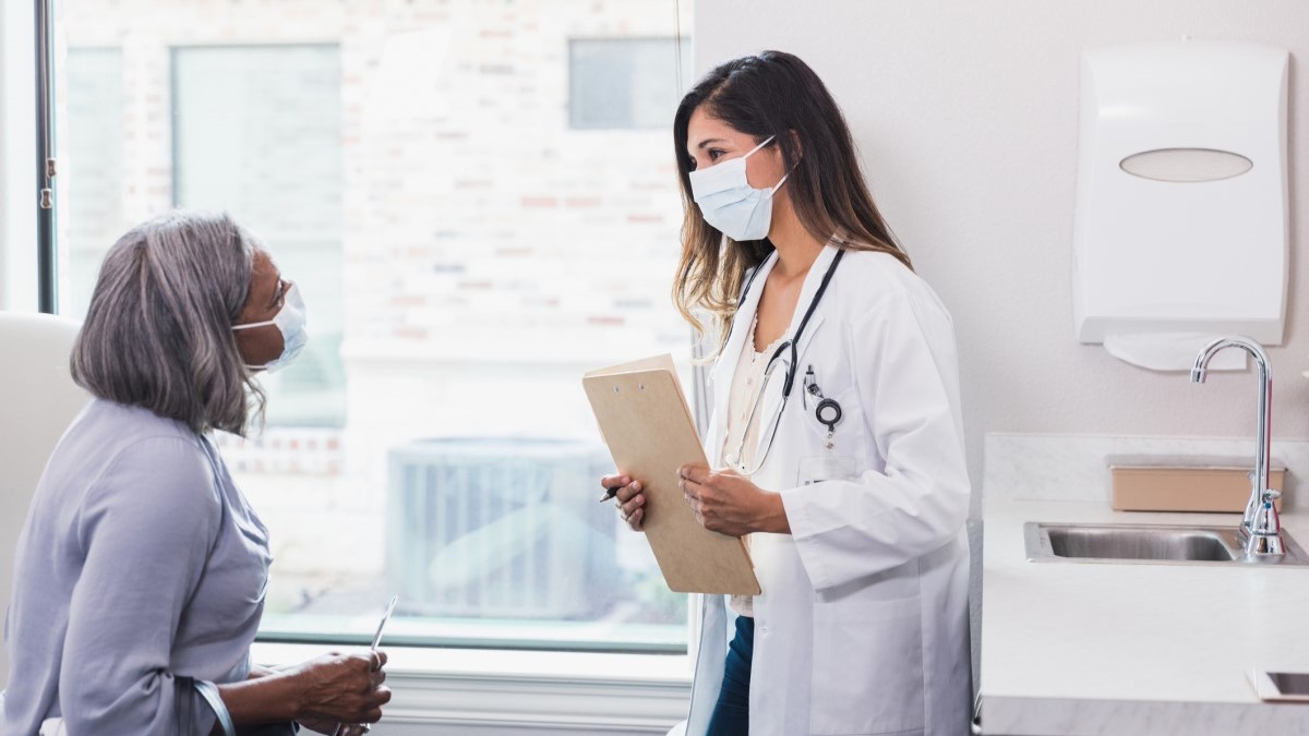 Patient Doctor a patient talking to her doctor