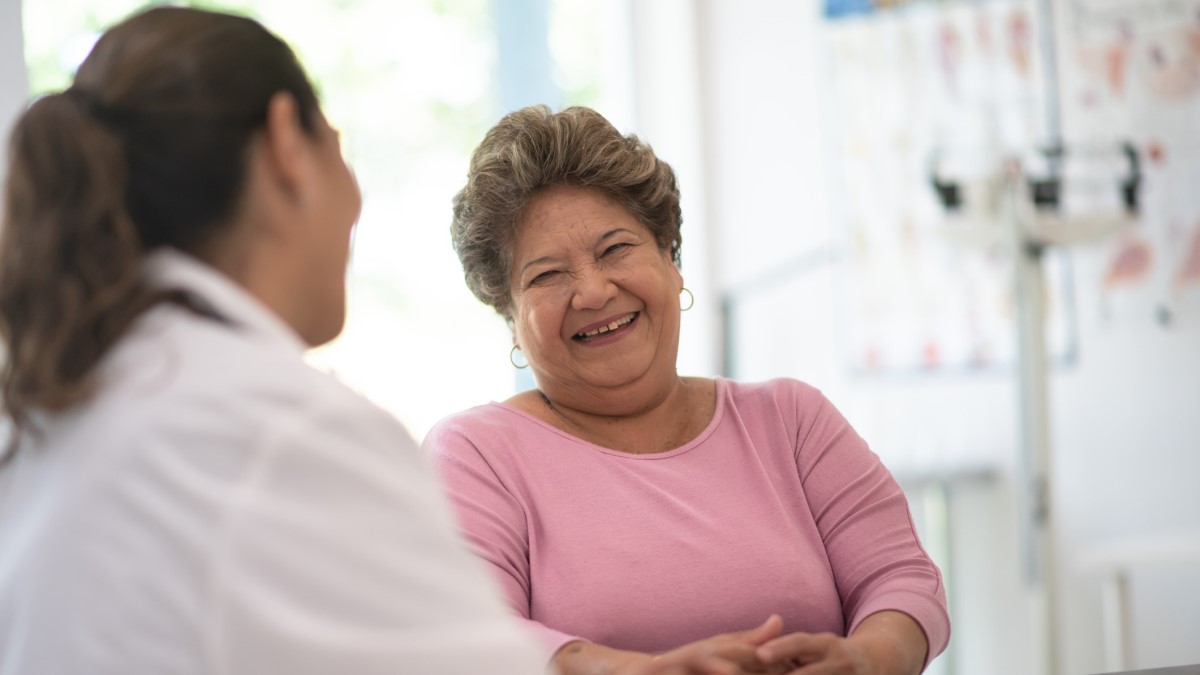 Woman with Doctor a woman talking to her doctor