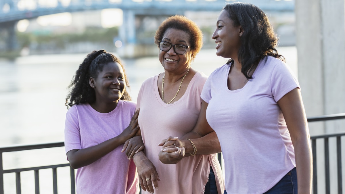 family-outdoors1200x675 A grandmother, her adult daughter, and granddaughter walk outdoors
