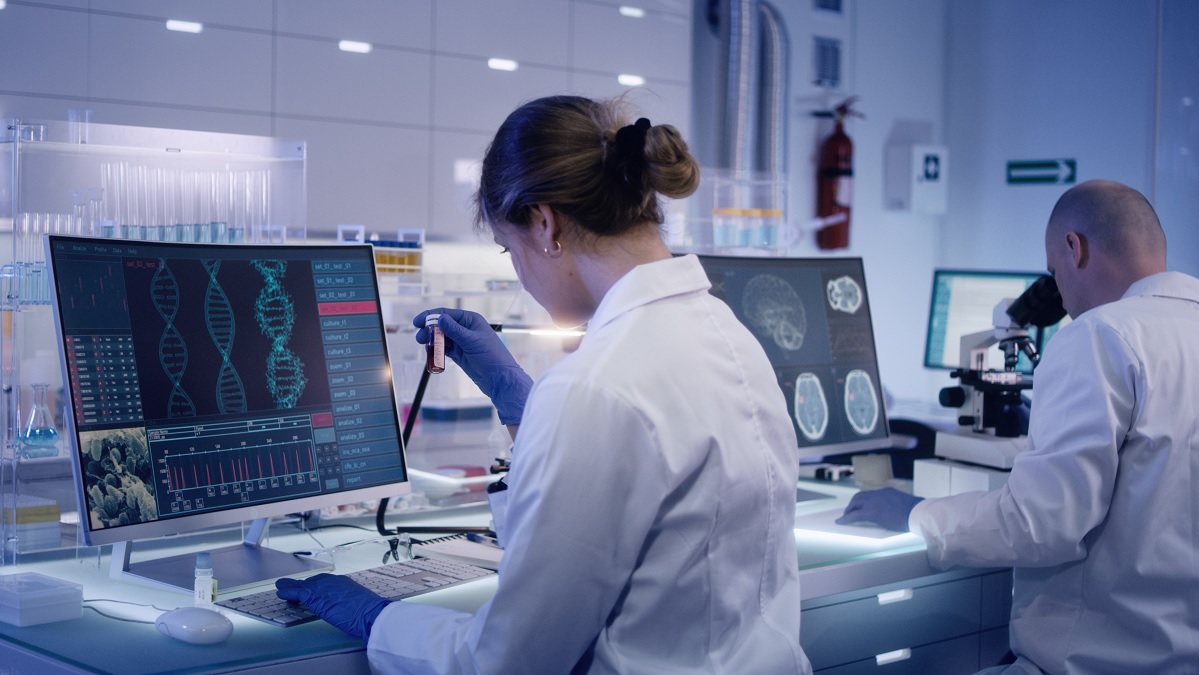 researchers Researchers study DNA mutations in a laboratory