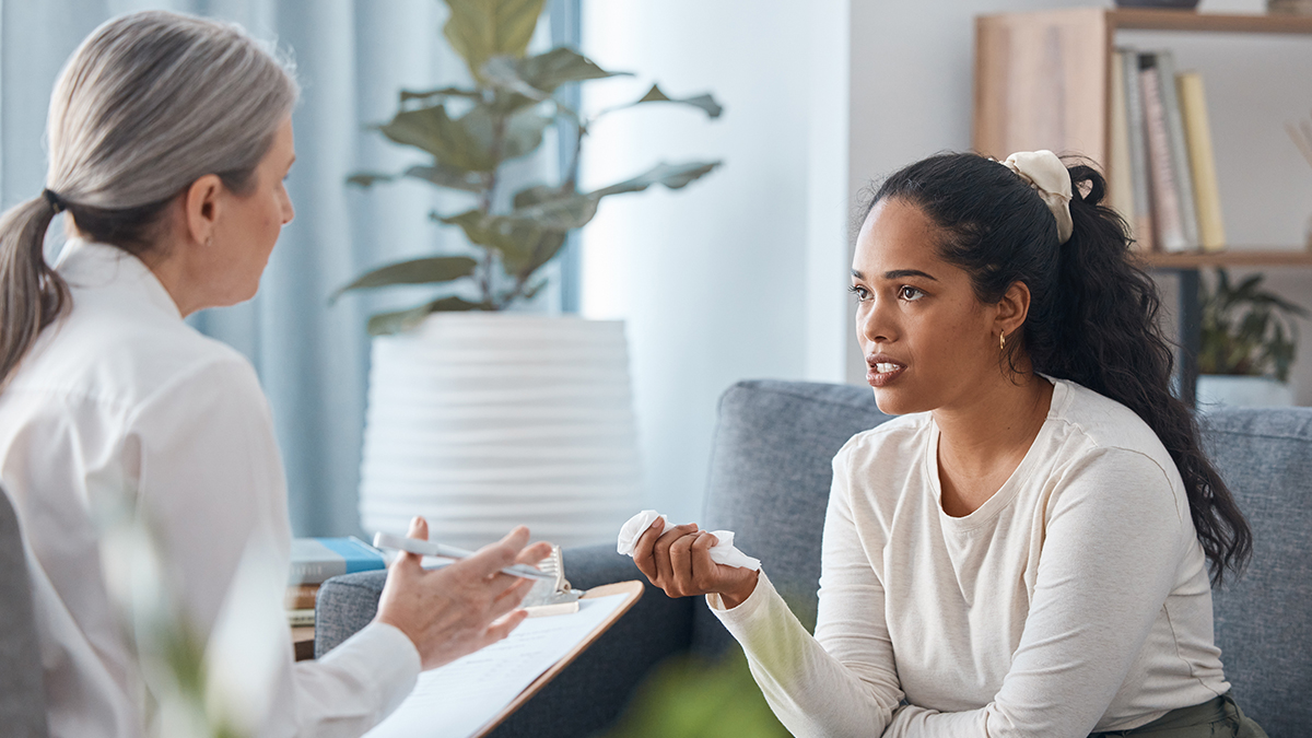 womanbeingconsulted.jpg A woman talking to a genetic counselor
