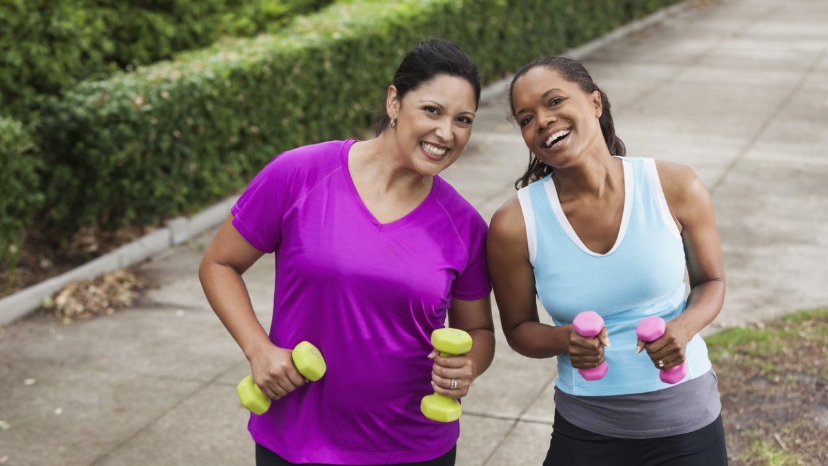 Healthy behaviors two women exercising