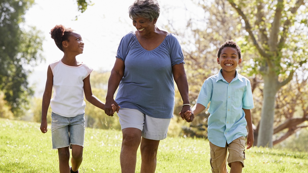 walking1200x675 Photo of a grandmother and her two grandchildren walking outside