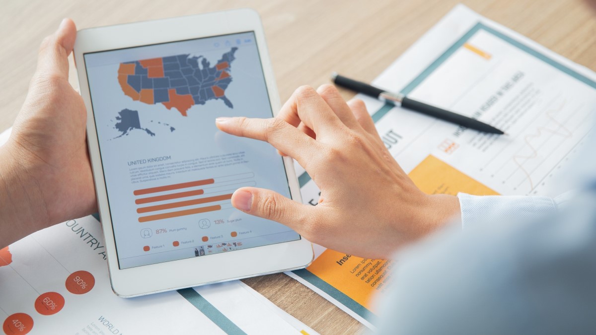 U.S. Map Tablet a person looking at data on a digital tablet
