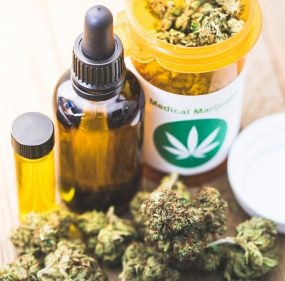 Picture7.jpg Medical marijuana including marijuana buds, a medicine bottle, and tincture bottle