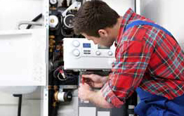 repair_sink_factsheet.jpg Technician servicing furnace