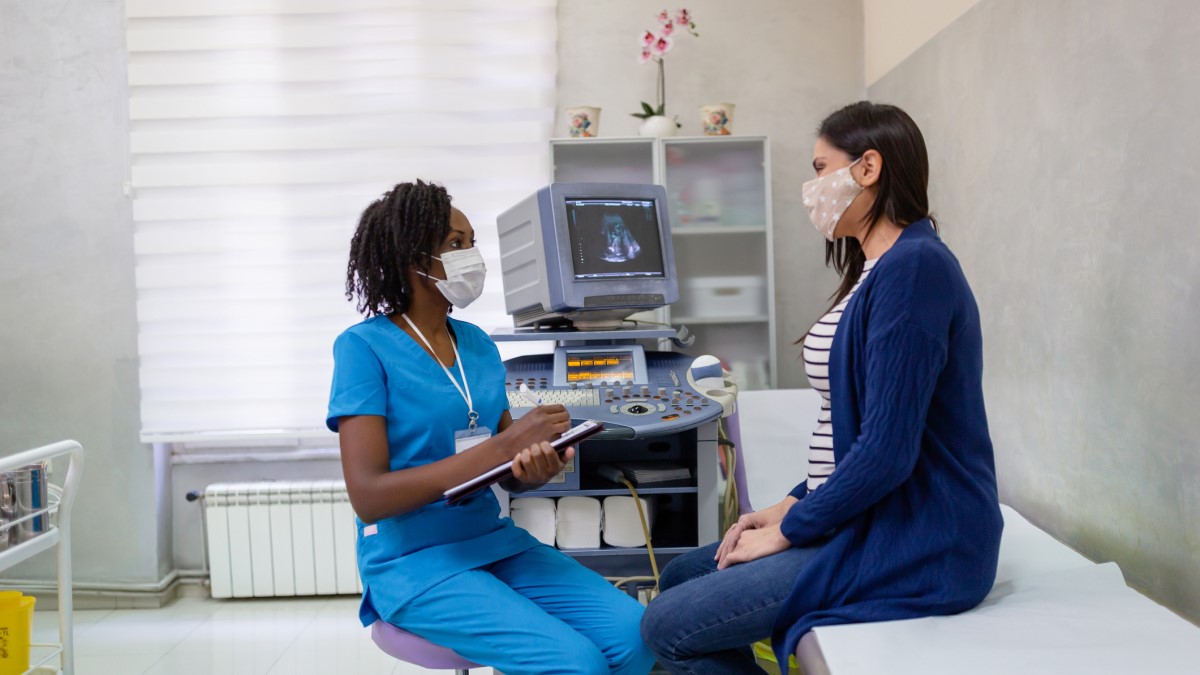Patient Doctor a woman talking to her doctor