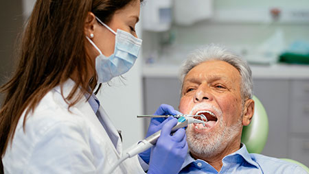 dentist-image-cr man in a dentist chair