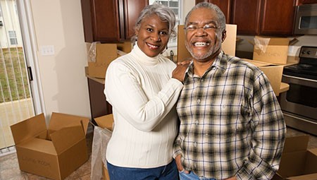 — title missing — Older man and older woman smiling.