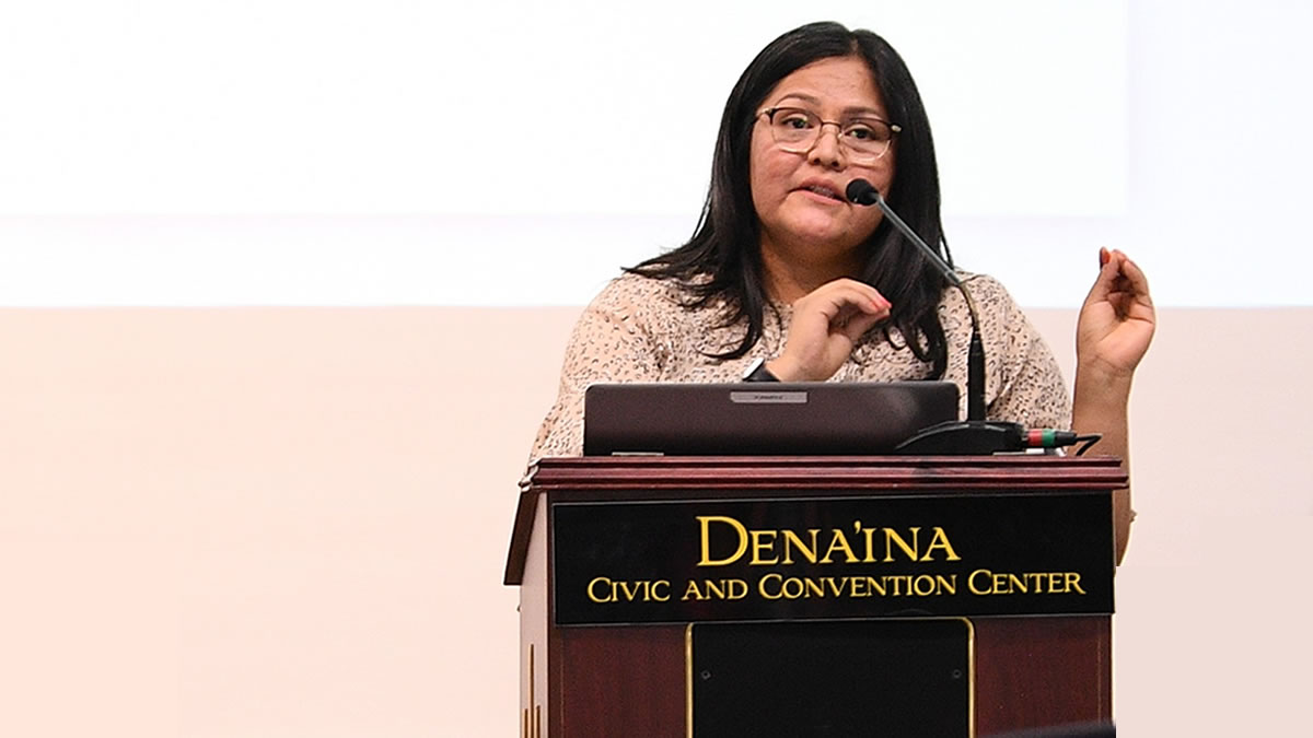 Jennel Clark Jennell Clark, Division Chief of Public Health Nursing for the Salt River Pima-Maricopa Indian Community, delivering a presentation on eCR at the National Tribal Health Conference. Photo courtesy of National Indian Health Board.
