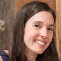 Maura-Leahy White woman with dark hair smiling
