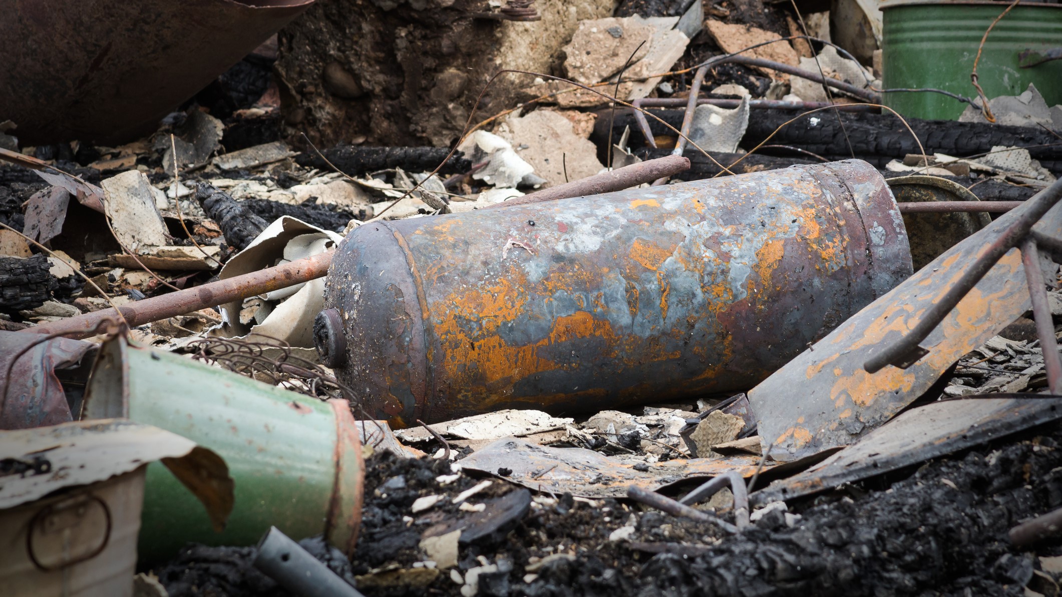 Burned Chemical Storage Tank Damaged propane tank.