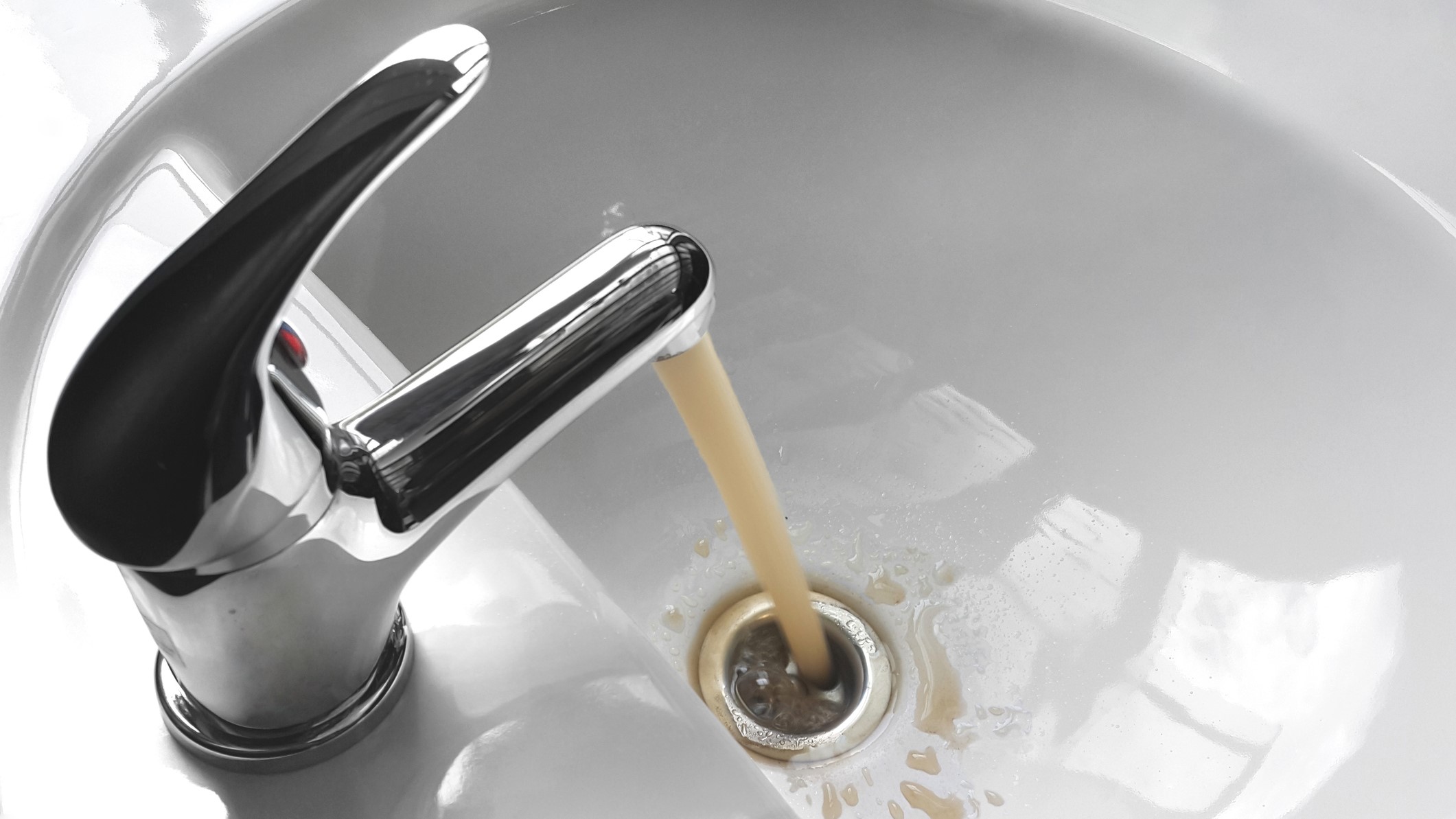 Discolored Water from Faucet Discolored water coming from faucet.