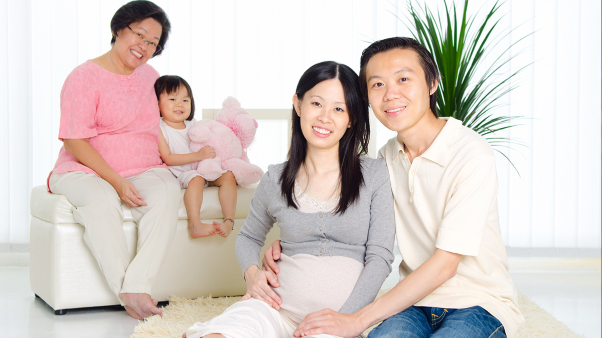 family_pregnant Extended family including grandmother, grandchild, pregnant mother, and father