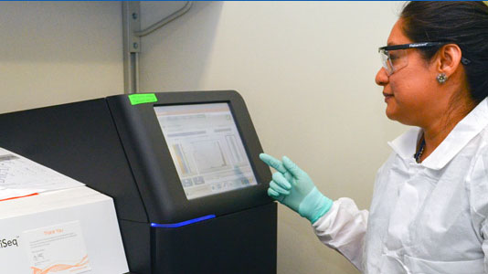 LLS Fellow Next Generation Sequencer A Laboratory Leadership Service fellow operates a next generation sequencer instrument in a CDC streptococcus laboratory. (Georgia, 2017)