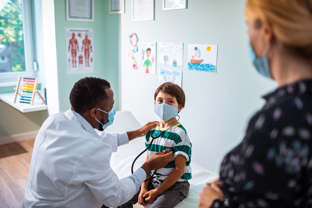 Child having a checkup with mask on Child having a checkup with mask on