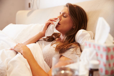 flu-if-you-get-sick Woman in bed with flu