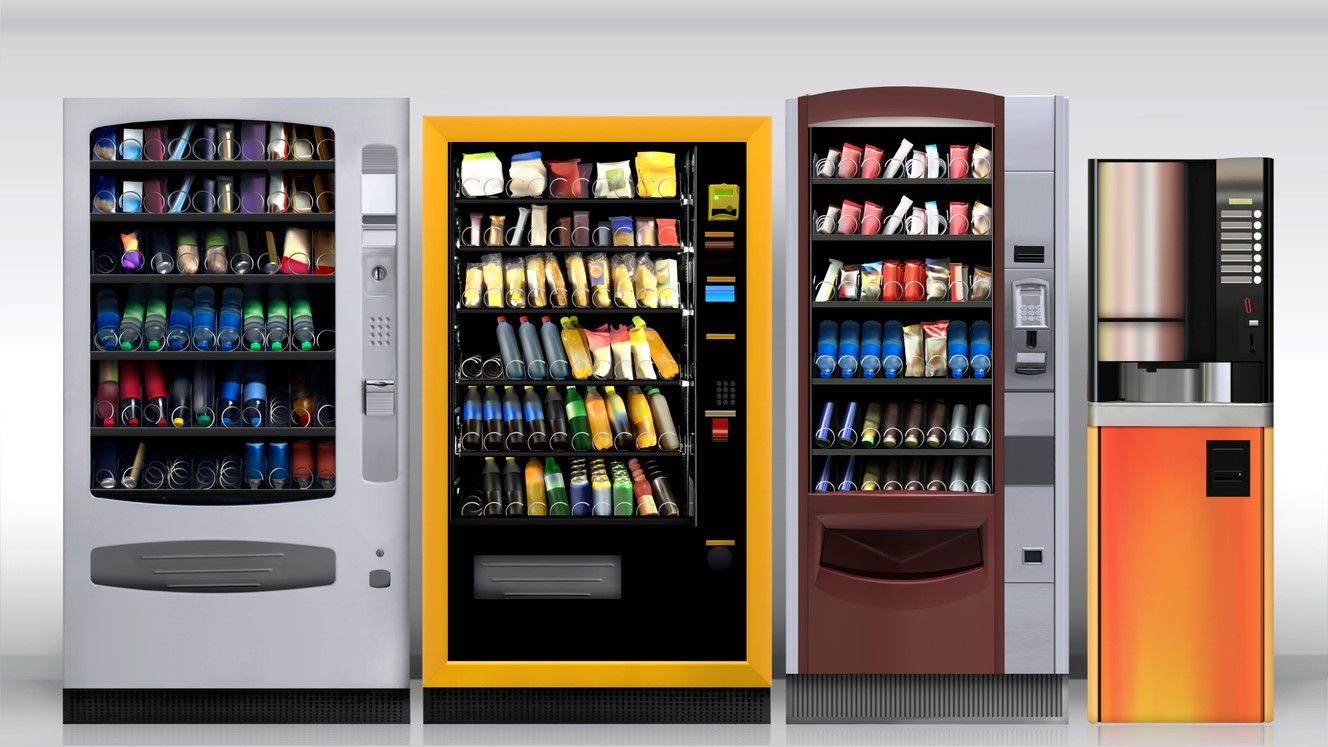 — title missing — Three vending machines and a coffee station.