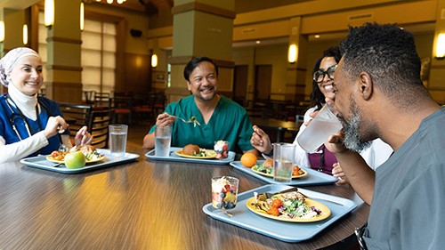 — title missing — Healthcare professionals eating in hospital cafeteria