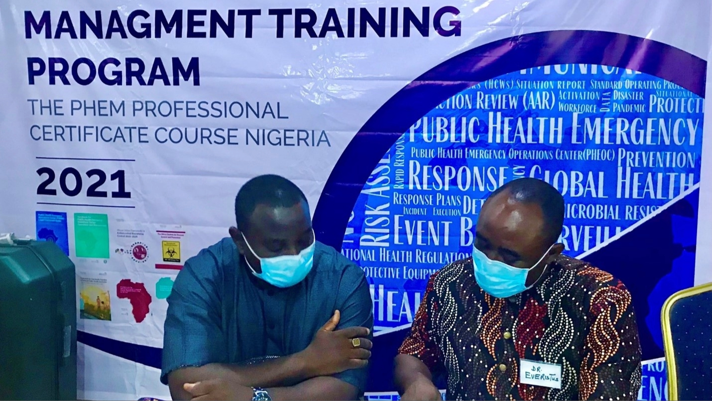 CDC-Helps-Nigeria-2 Facilitators reviewing a session on PHEOC De-Escalation and De-Activation
