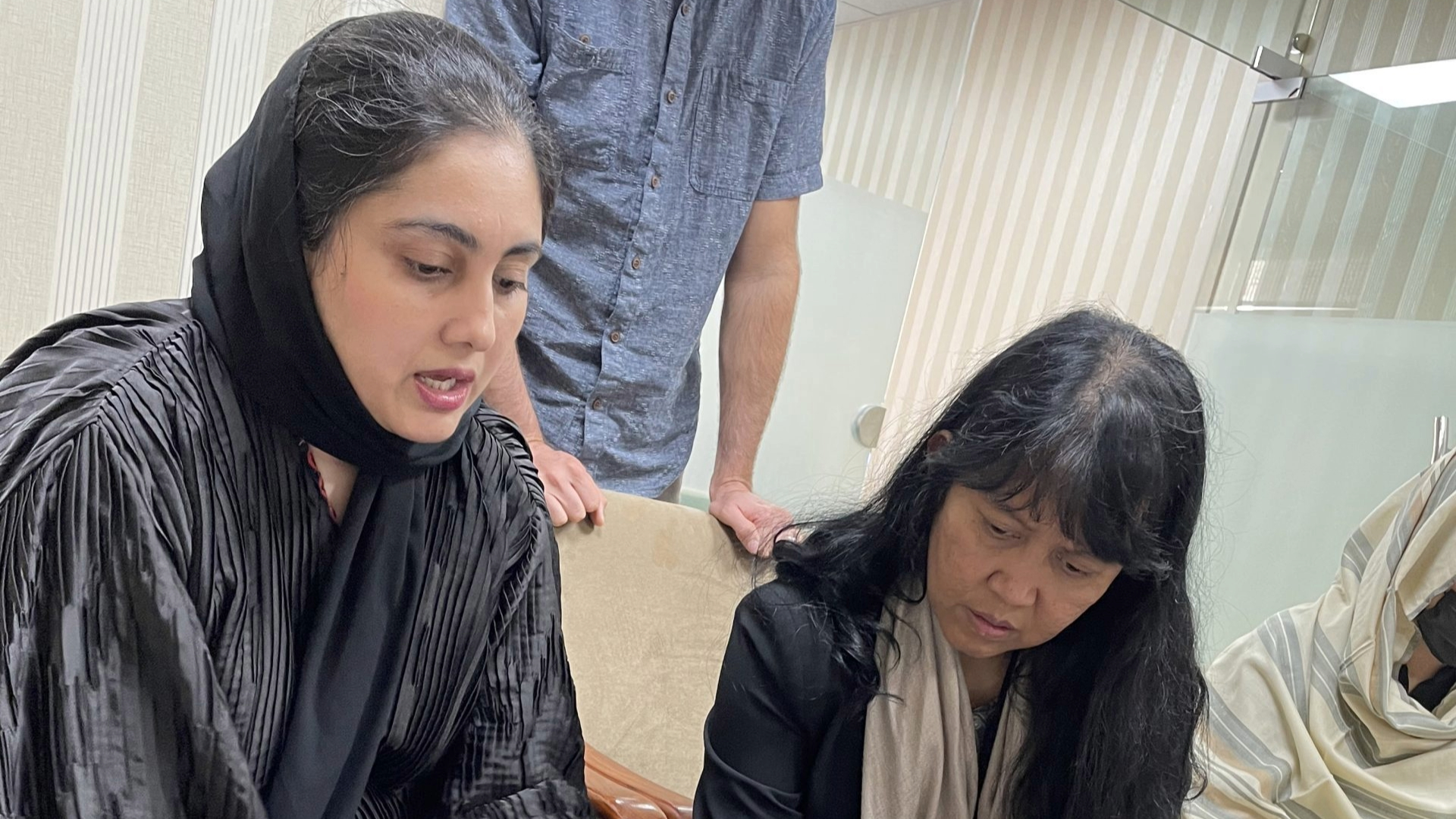 Emergency_Preparedness_1 CDC epidemiologist Endang Handzel works with Dr. Hana Yahya to assess death records and trends