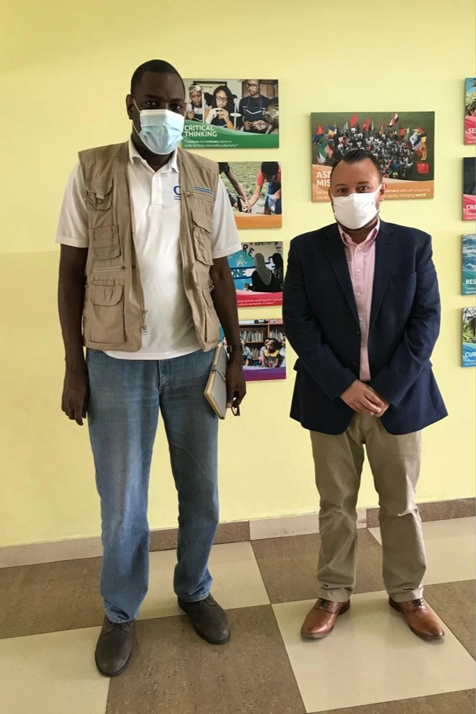 FETP-Supports-International-School-Vaccinating-2 FETP Resident Advisor, Dr. Adama N’Dir (left), and ASD Director, Michael Breece (right)