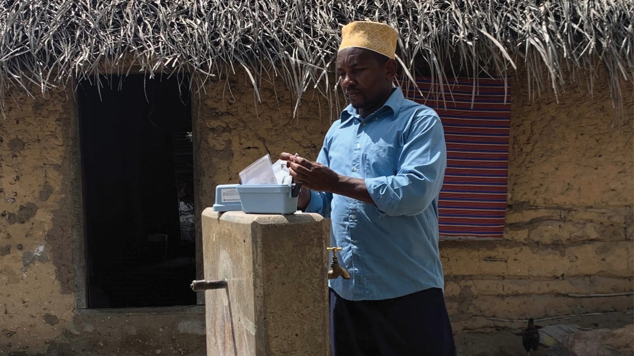 Support-improving-Zanzibars-Water-Supply-1 ZAWA technician conducting a monitoring visit at a community tap stand
