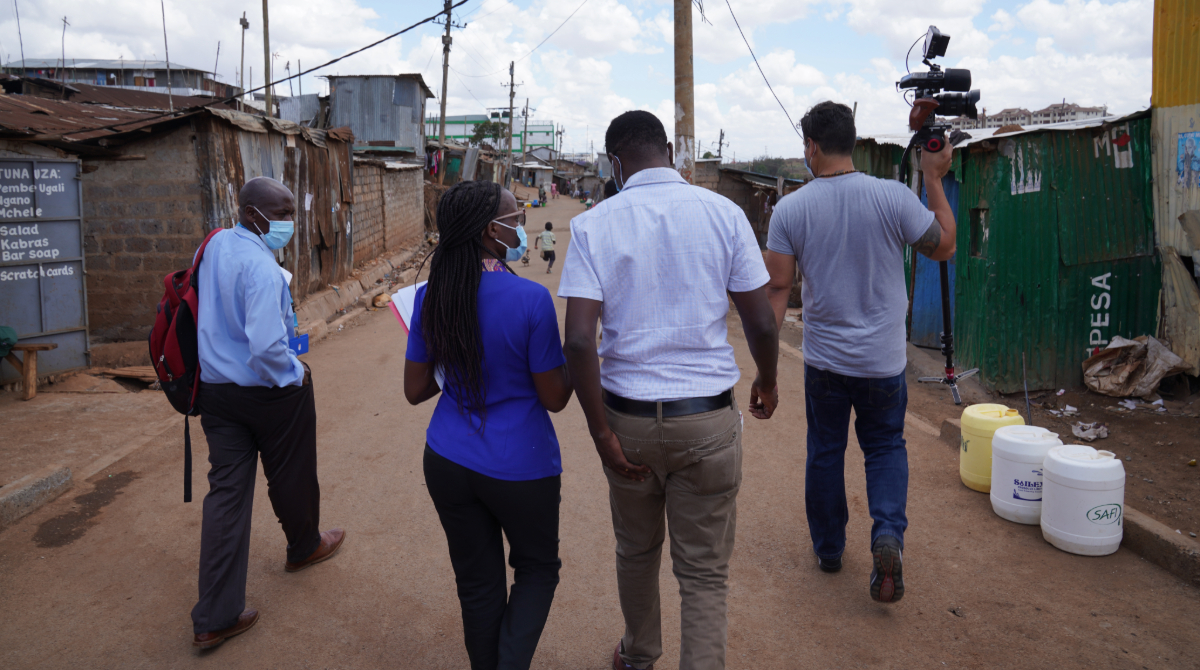 Kenya_Field_Response Group of workers walking outside in Kenya.