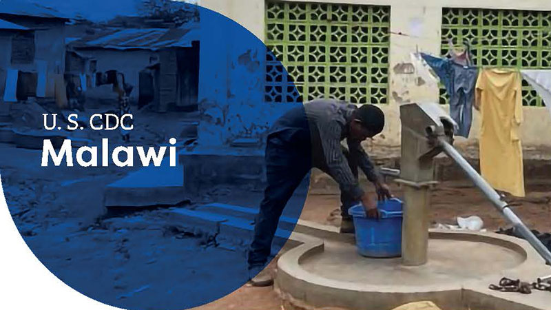 A person at a water pump in Malawi, symbolizing CDC’s public health initiatives.
