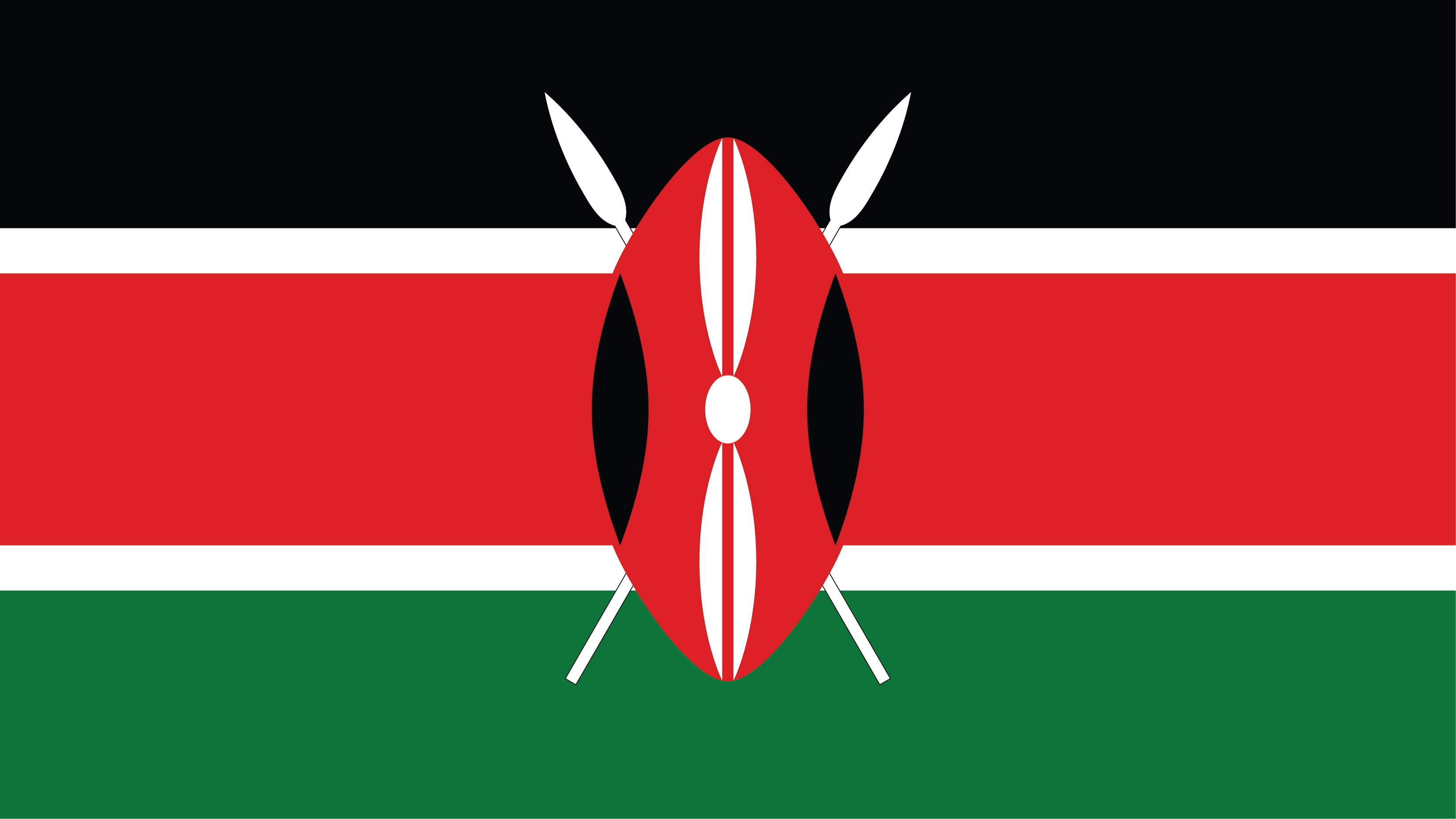 Three equal horizontal bands of black (top), red, and green; the red band is edged in white; a large Maasai warrior's shield covering crossed spears is superimposed at the center. The Maasai are a Nilotic ethnic group inhabiting northern, central and southern Kenya and northern Tanzania.