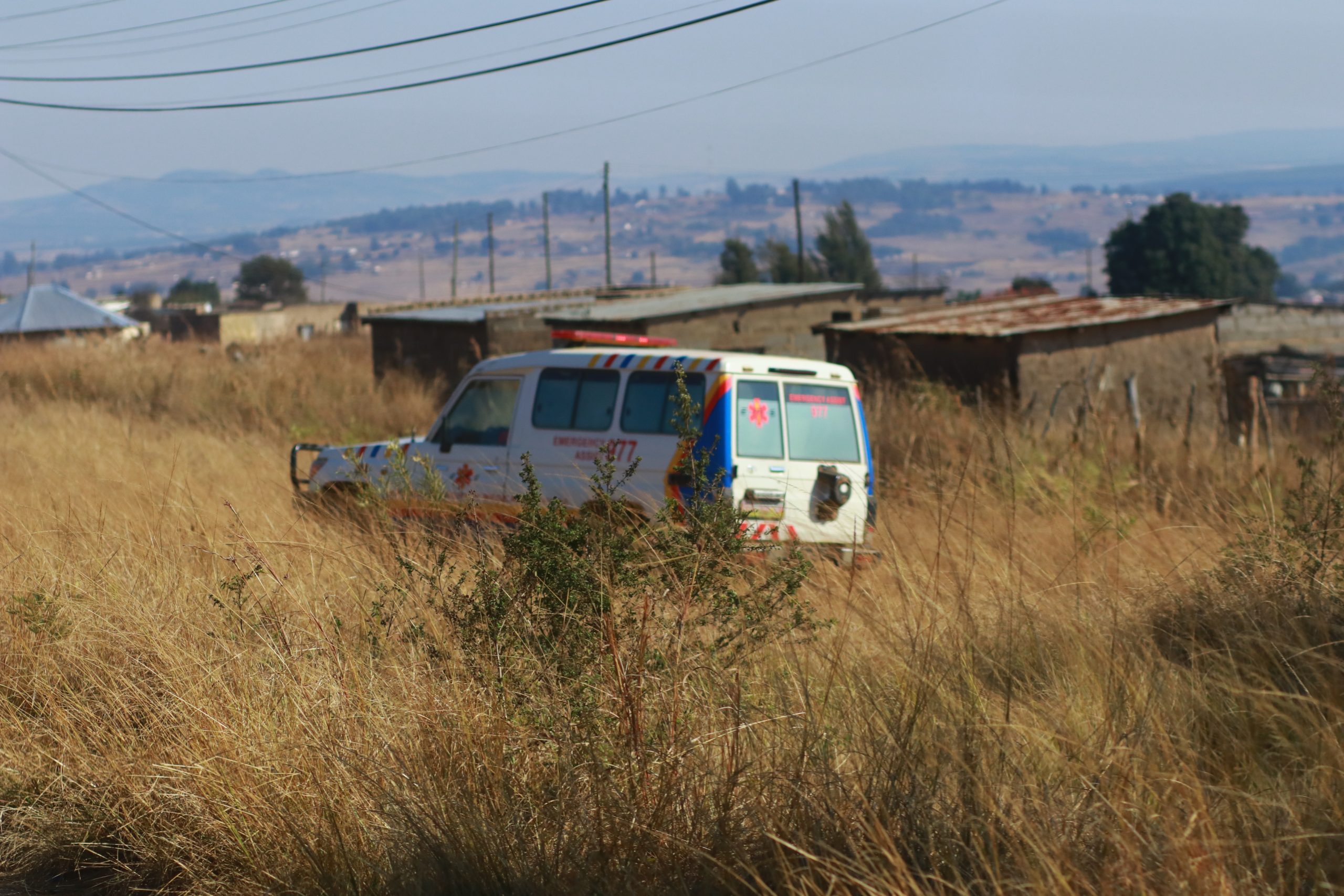 Success story Eswatini TB Ambulance parked in a field in Eswatini