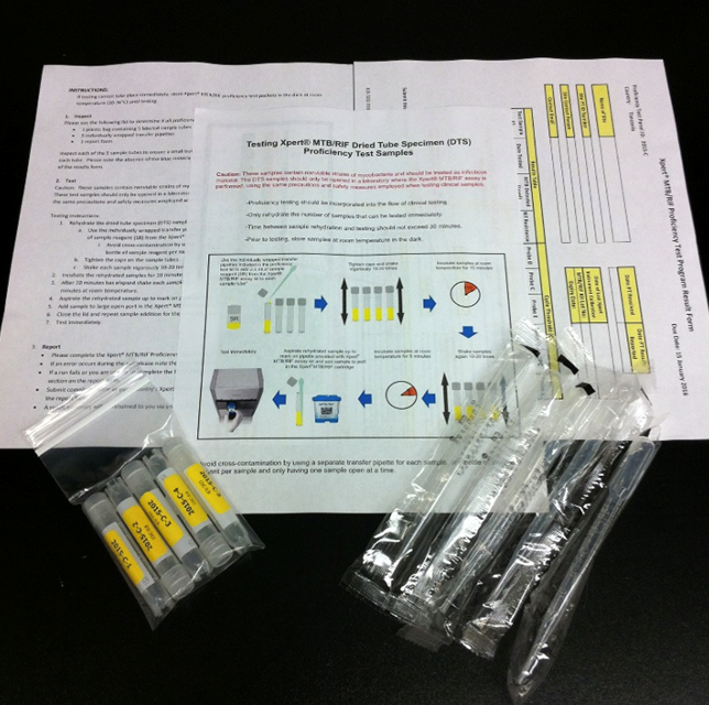 2024_SuccessStory_WTBD A pamphlet, vials, and materials that are included in an Xpert TB Proficiency Testing program sample kit.