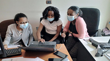 unknown_ethiopia_tpt_unknown Health care workers review records at hospital in Ethiopia