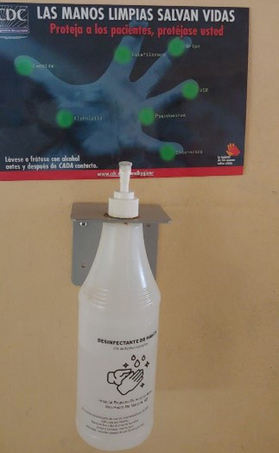 Hand Hygiene Educational Materials Hand hygiene educational materials with locally produced alcohol-based hand rub at a hospital in Moca, Dominican Republic.