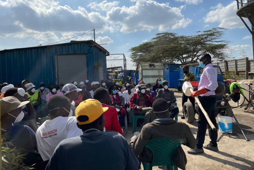Public Health Partners in Kenya Public health partners in Kenya train sanitation workers who empty pit latrines on hygiene practice and personal protective equipment use.