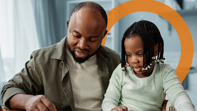 Concussion Recovery Father and child work on a coloring book