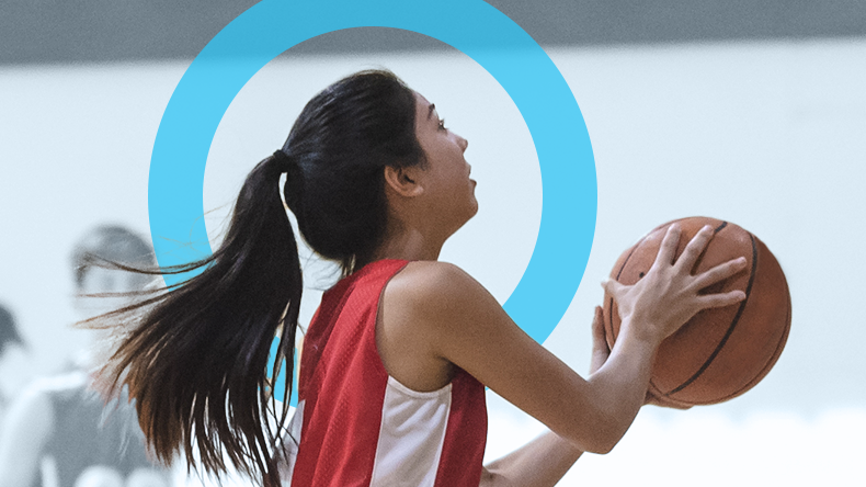 -- title missing -- Girl playing basketball