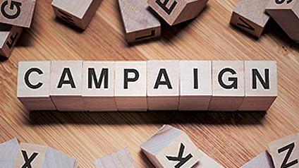 Scrabble letters spelling out the word Campaign representing Featured Campaigns.