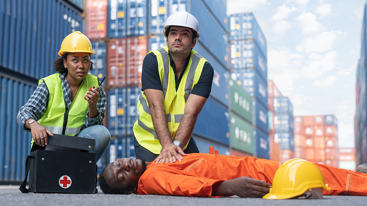 cardiac-arrest Construction worker performing CPR on a co-worker that had cardiac arrest.