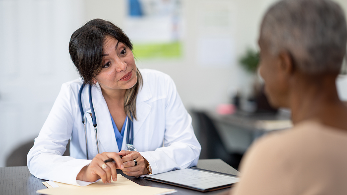 cardiomyopathy2 Physician speaking with a female patient.