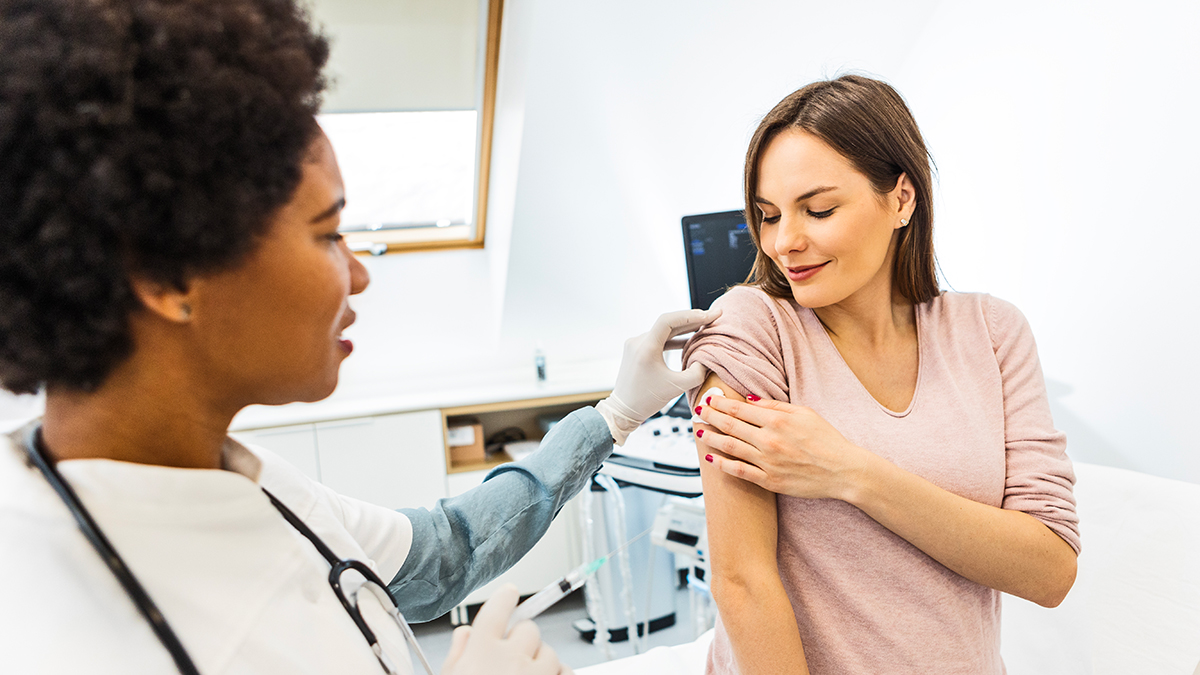 Hepatitis B Prenatal Testing Administration Thumbnail A healthcare professional administering a vaccine to a pregnant woman