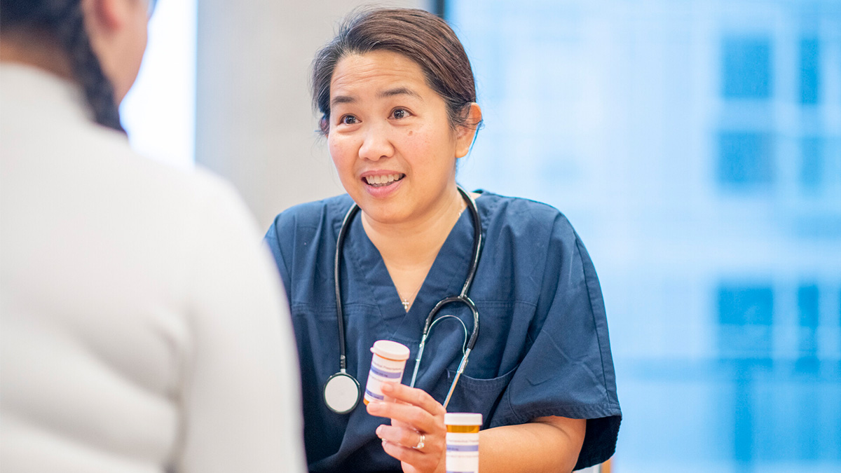 Doctor consultation about medications A doctor advises a patient about prescription medications.