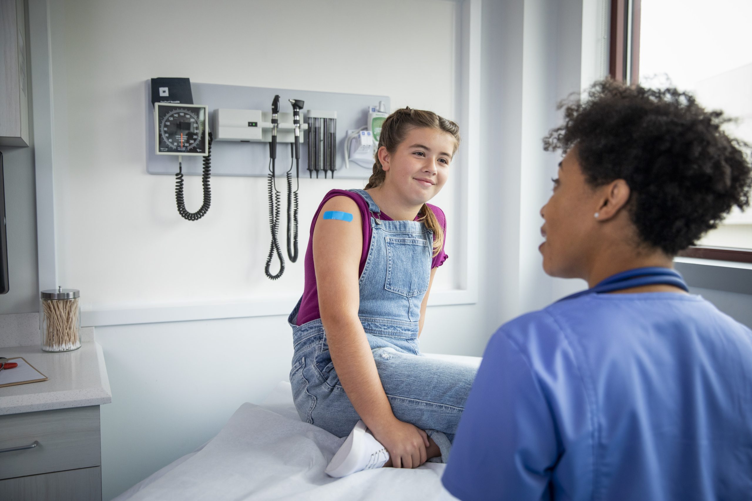 Patient talks to doctor Patient talks to doctor about HPV vaccination.