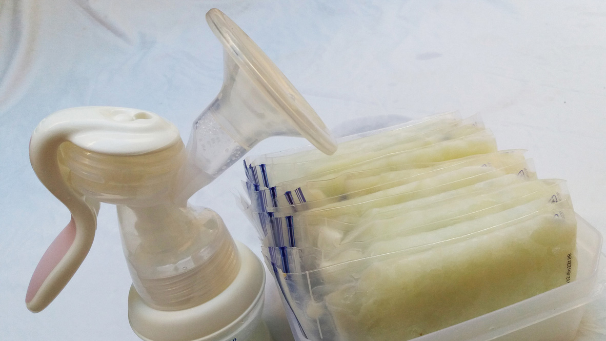 Storing breast milk A breast pump and frozen packets of milk