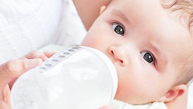 bottle feeding A baby being fed by bottle.